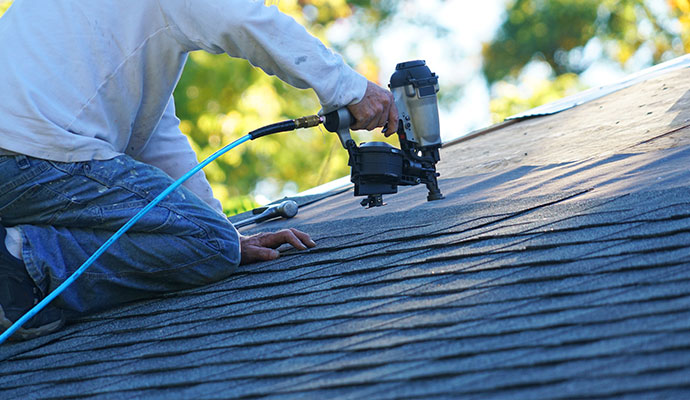 handyman installing roof
